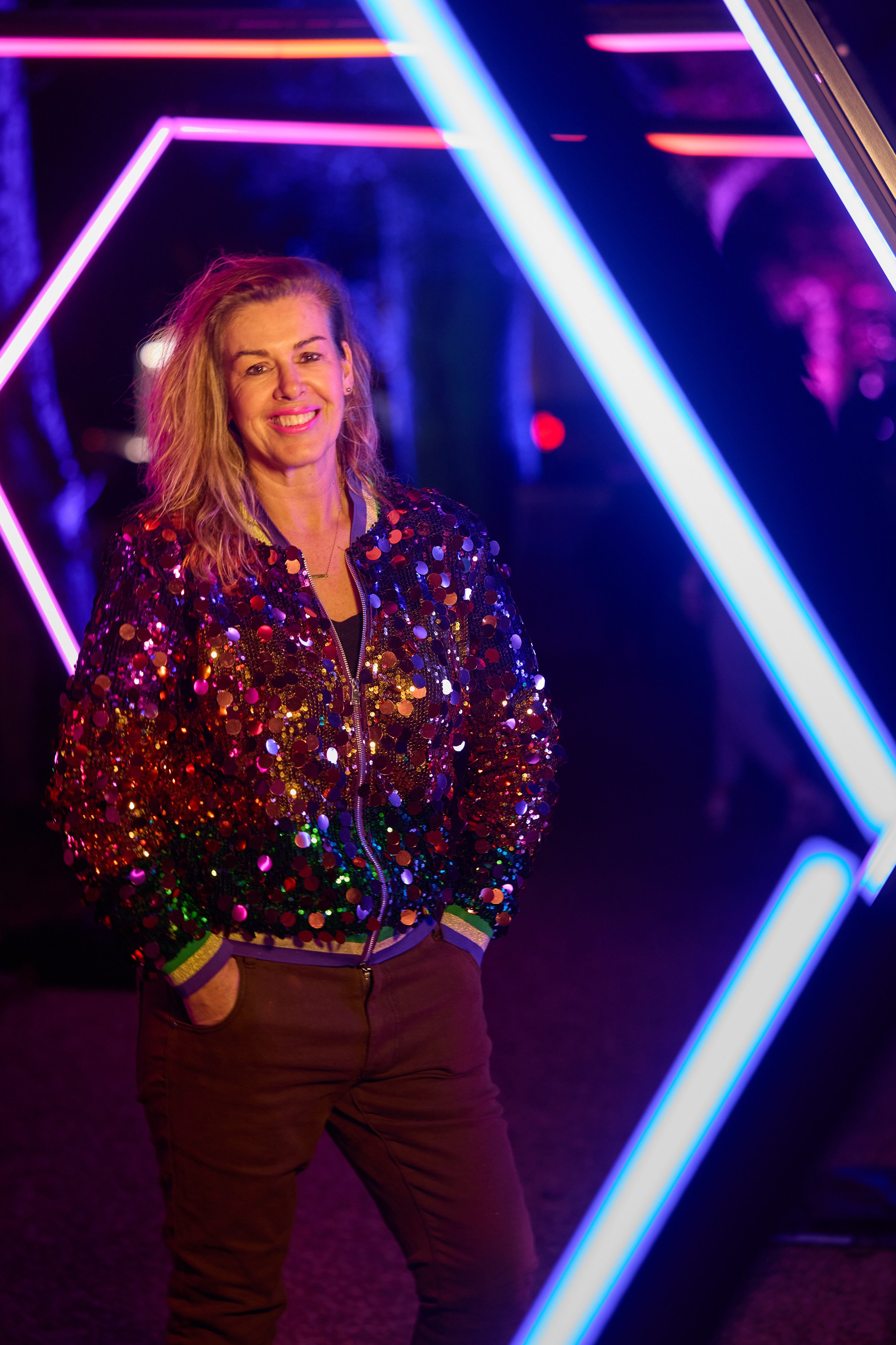 Carla O'Brien with her Neon Angel Wings installation